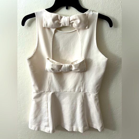 kate spade Tops - Kate Spade - Double Bow Open Back Peplum Top in Cream size 6